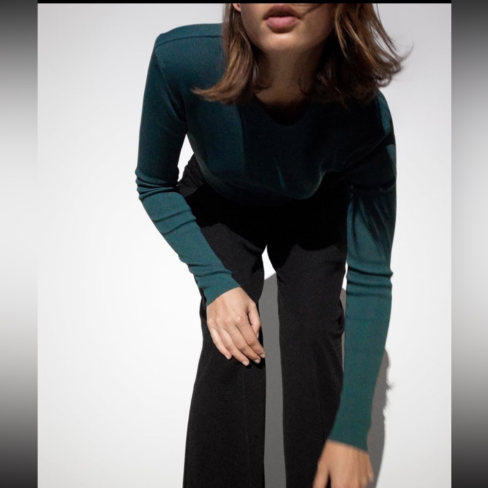 Small greenish top with shoulder pads